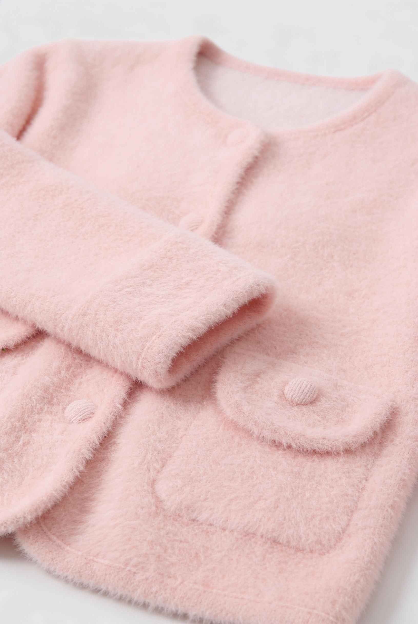 Pink long cardigan sweater with open front from Lumina Wear, featuring a cozy, relaxed fit and soft knit fabric.