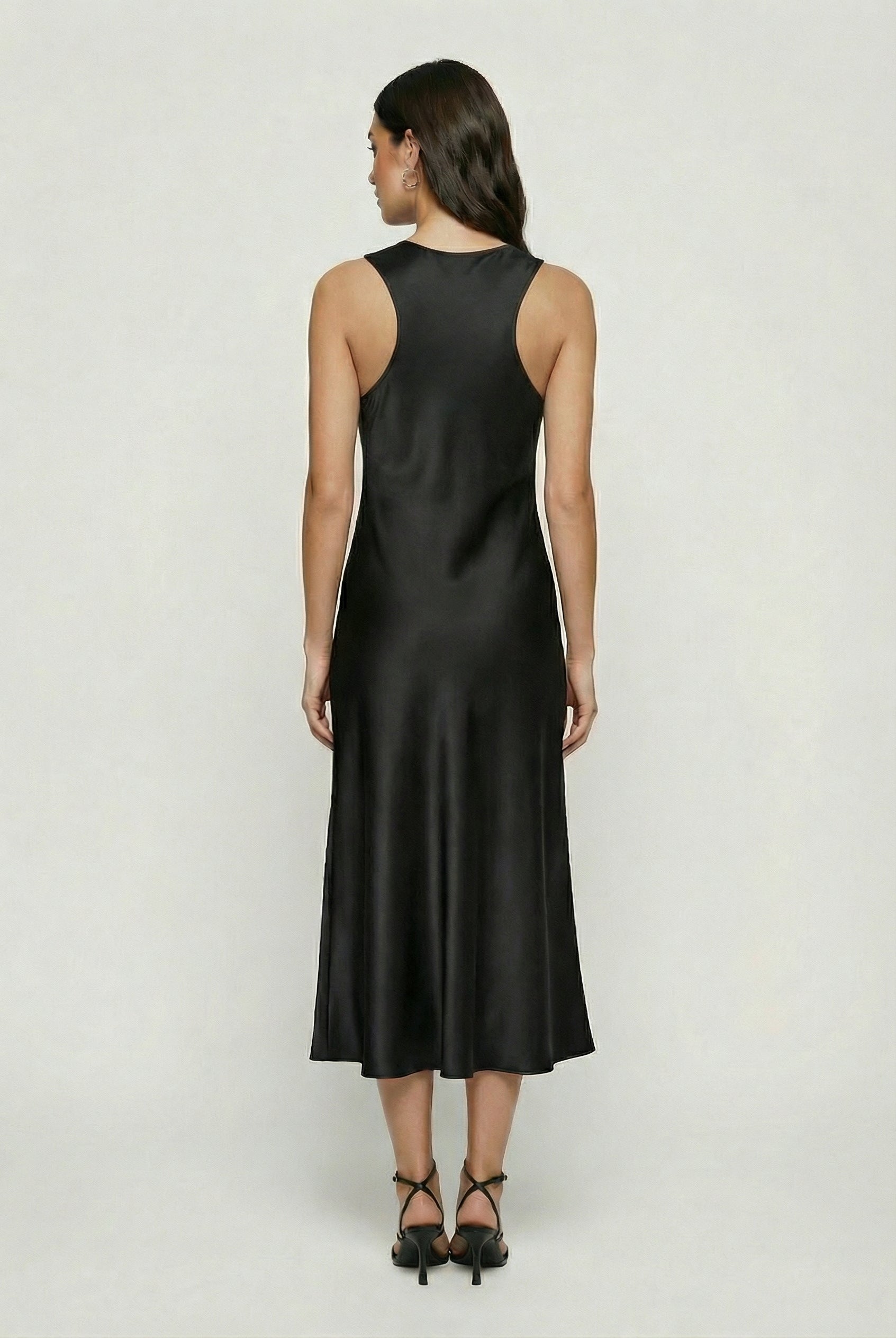 Elegant black maxi dress by Lumina Wear featuring a flattering silhouette, perfect for formal occasions.