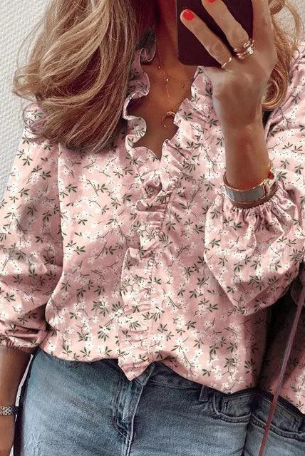 Blue Serena Lumina Wear blouse with ruffle details and V-neck, stylish and elegant for casual or dressy occasions.