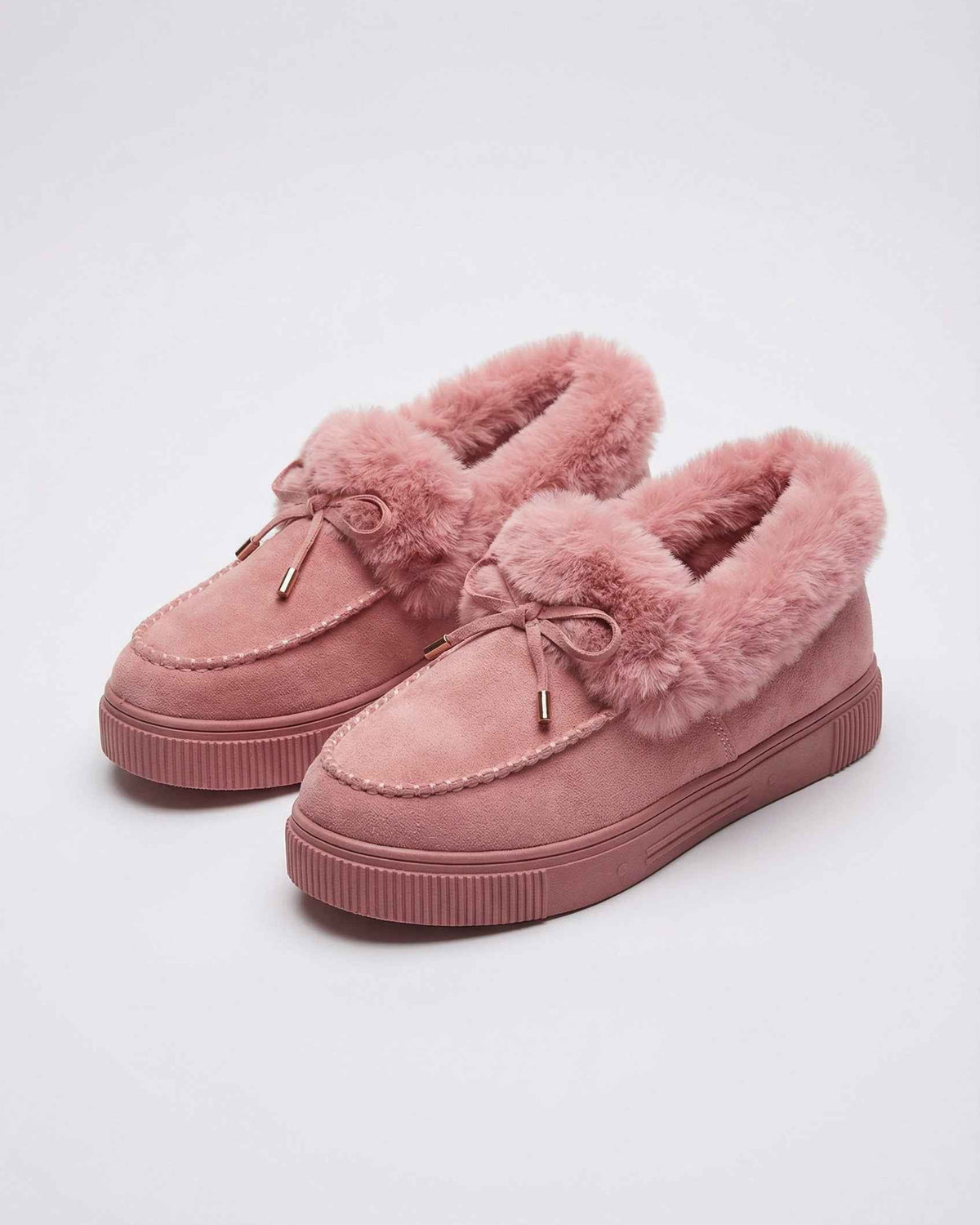 Pink cozy-lined winter boots for women from Lumina Wear, featuring stylish design and comfortable winter footwear.