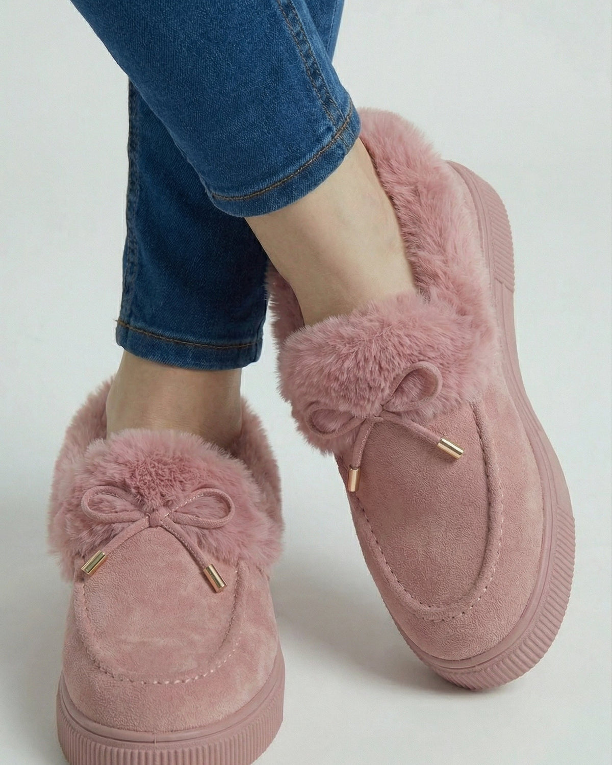 Pink cozy-lined winter boots for women from Lumina Wear, featuring stylish design and winter-ready warmth.