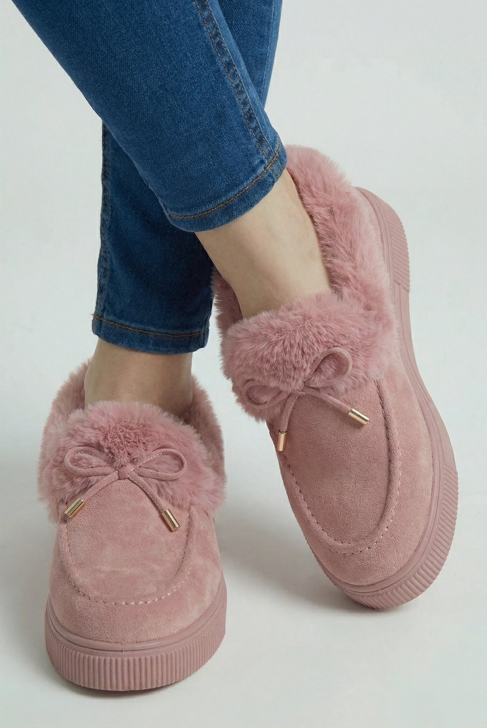 Pink cozy-lined winter boots for women from Lumina Wear, featuring stylish design and winter-ready warmth.