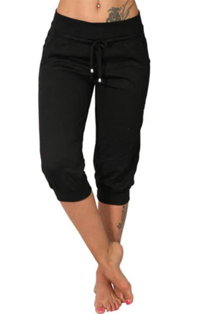 Lumina Wear Serena grey Capri trousers with elastic waistband, casual style, shown on a model.