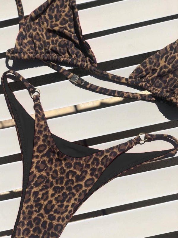 Red animal print bikini set from Lumina Vancouver with a stylish, sexy design, perfect for summer beachwear.