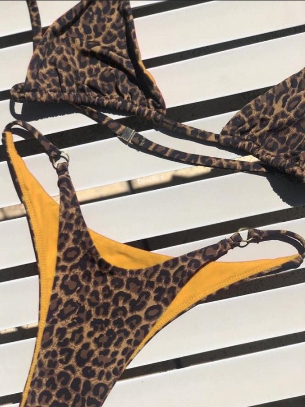 Red animal print bikini set by Lumina Vancouver, featuring a stylish two-piece swimwear design with a sexy, fitted look.