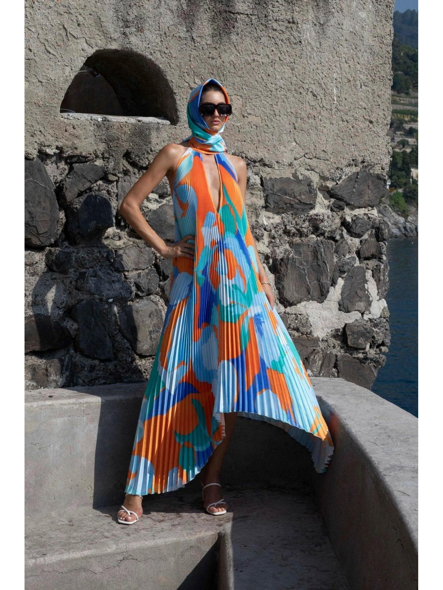 Multicolor Shalia halter pleated maxi dress by Lumina Vancouver, featuring a sultry design and flowing fabric.