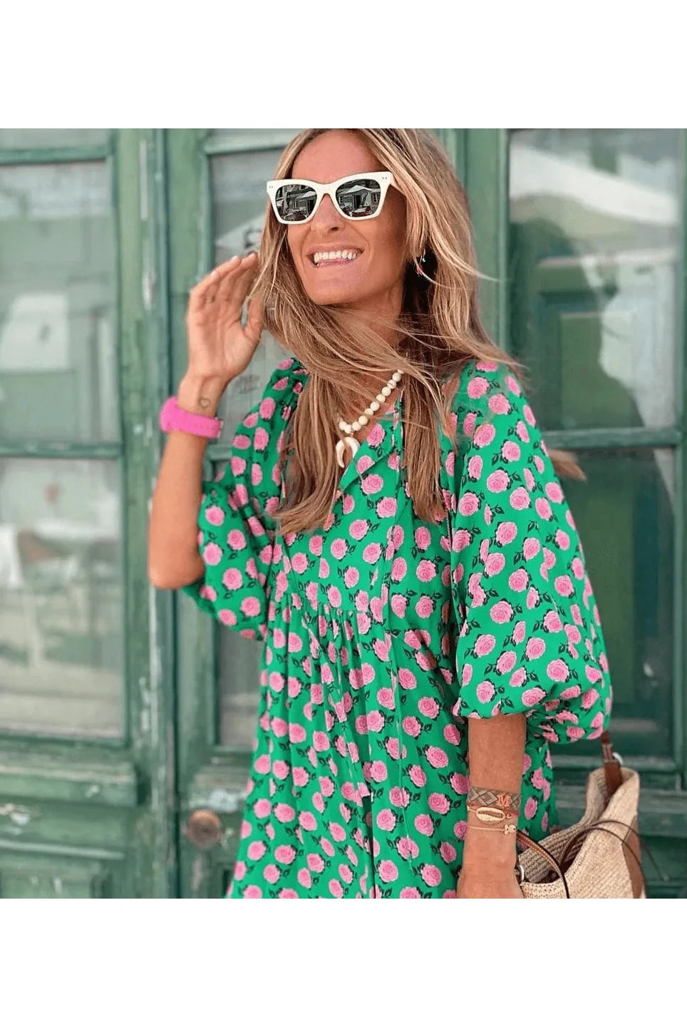Green and white Sharon spring dress by Lumina Wear, featuring a stylish, lightweight design perfect for warm weather.