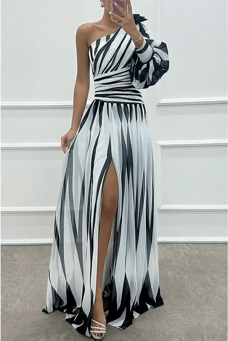 Elegant white Shiloh striped one-shoulder maxi dress by Lumina Wear, flowing fabric with stylish design and asymmetric shoulder detail.