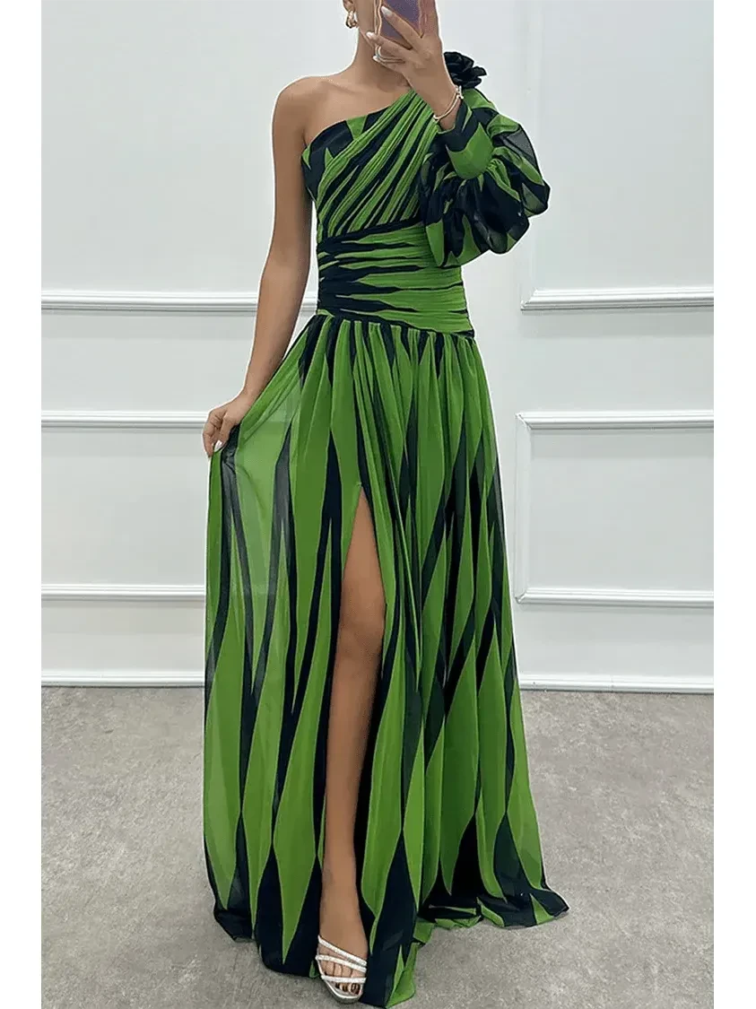 Elegant white Shiloh striped one-shoulder maxi dress by Lumina Vancouver styled on a model, showcasing its flowing fabric and design.
