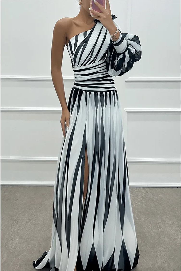 Lumina Wear Shiloh elegant striped one-shoulder maxi dress in white, flowing design with stylish shoulder detail.