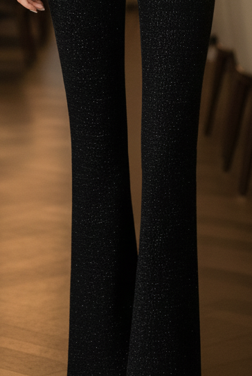 Sienna Midnight double-breasted suit set by Lumina Vancouver, featuring a sleek black blazer and matching trousers.