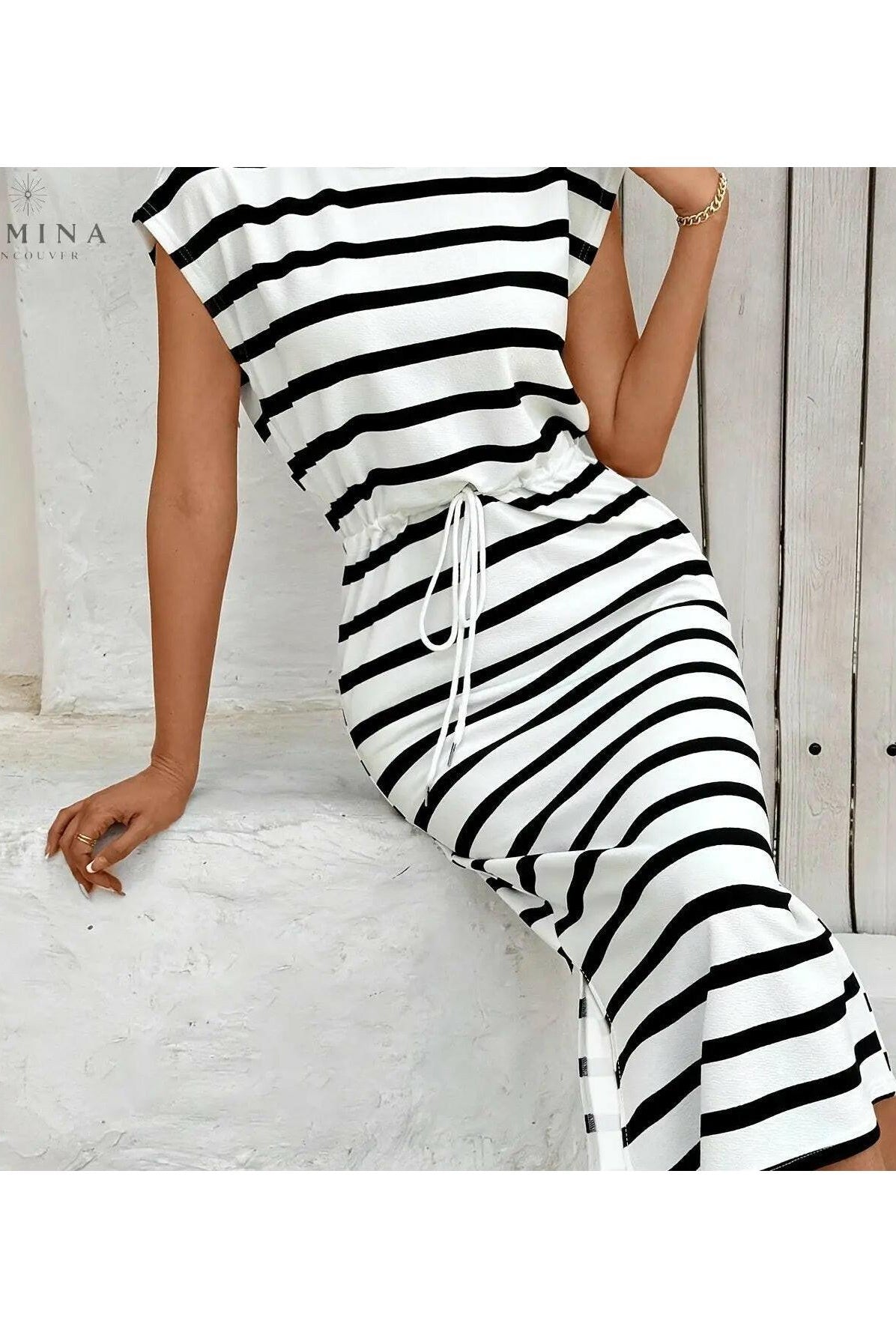 White Sienna striped knit dress by Lumina Vancouver, featuring a fitted silhouette and stylish pattern.