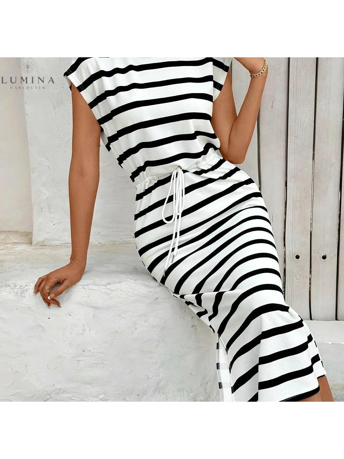 White Sienna striped knit dress by Lumina Vancouver, featuring a fitted silhouette and stylish pattern.