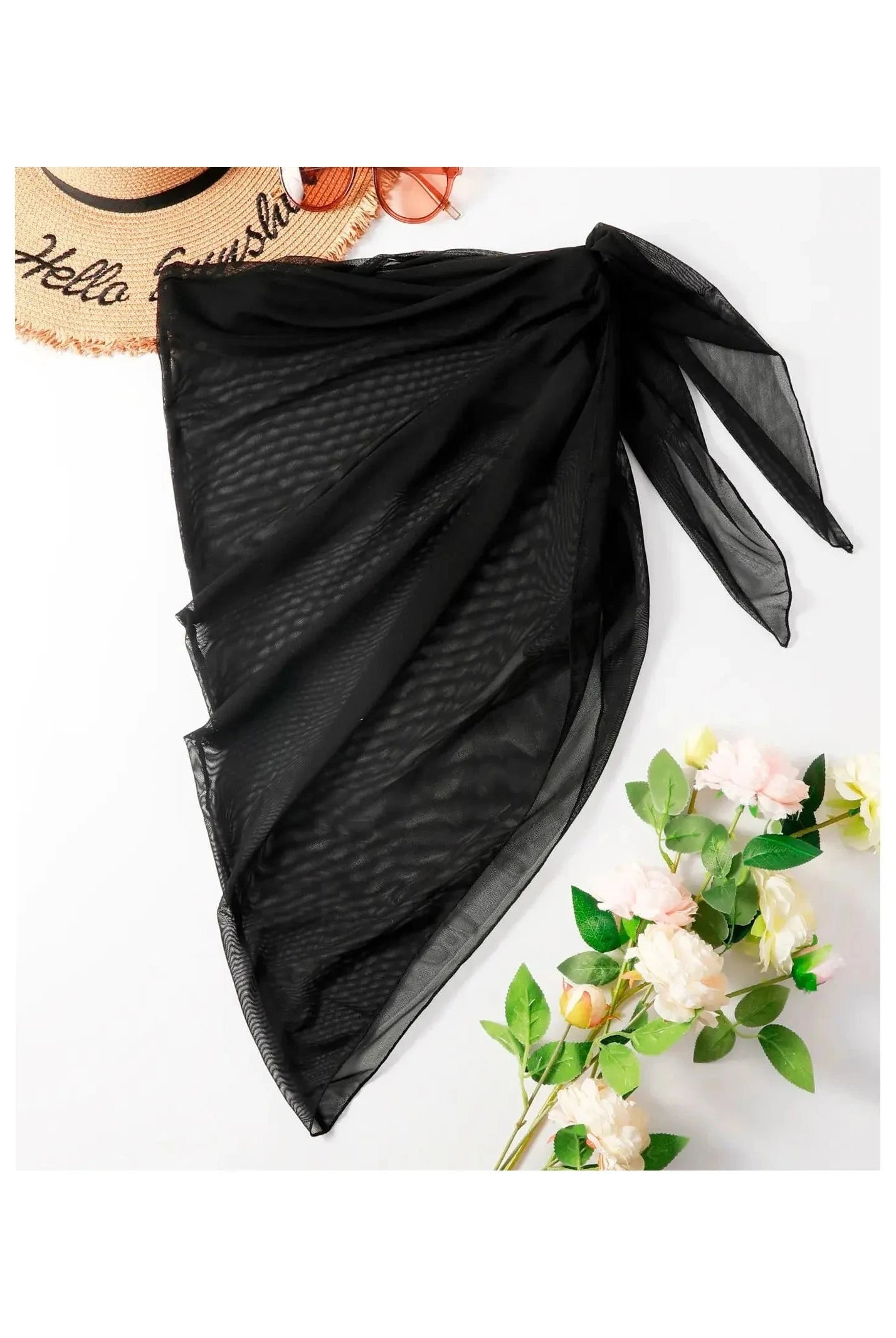 Black summer cover-up skirt by Lumina Vancouver featuring lightweight fabric and relaxed fit for beach or casual wear.
