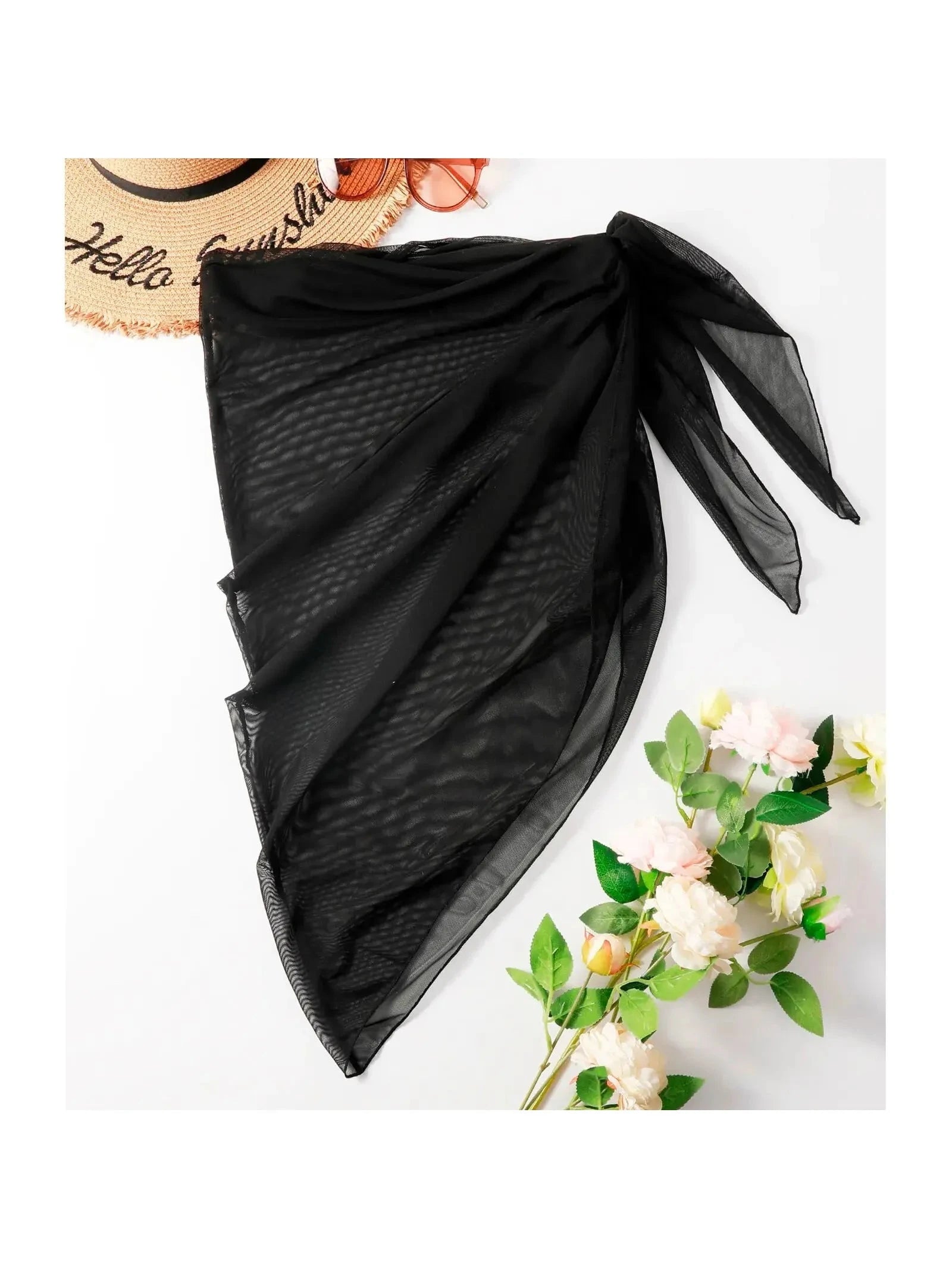 Black summer cover-up skirt by Lumina Vancouver featuring lightweight fabric and relaxed fit for beach or casual wear.