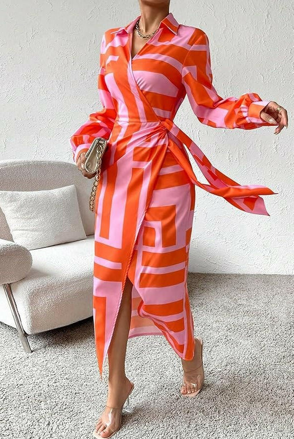 Lumina Wear Solana printed wrap dress in orange and pink with a flowy design, displayed on a model.