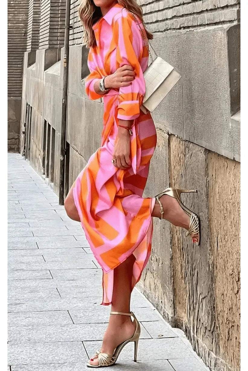 Lumina Wear Solana printed wrap dress in orange and pink, lightweight and stylish for casual or dressy occasions.