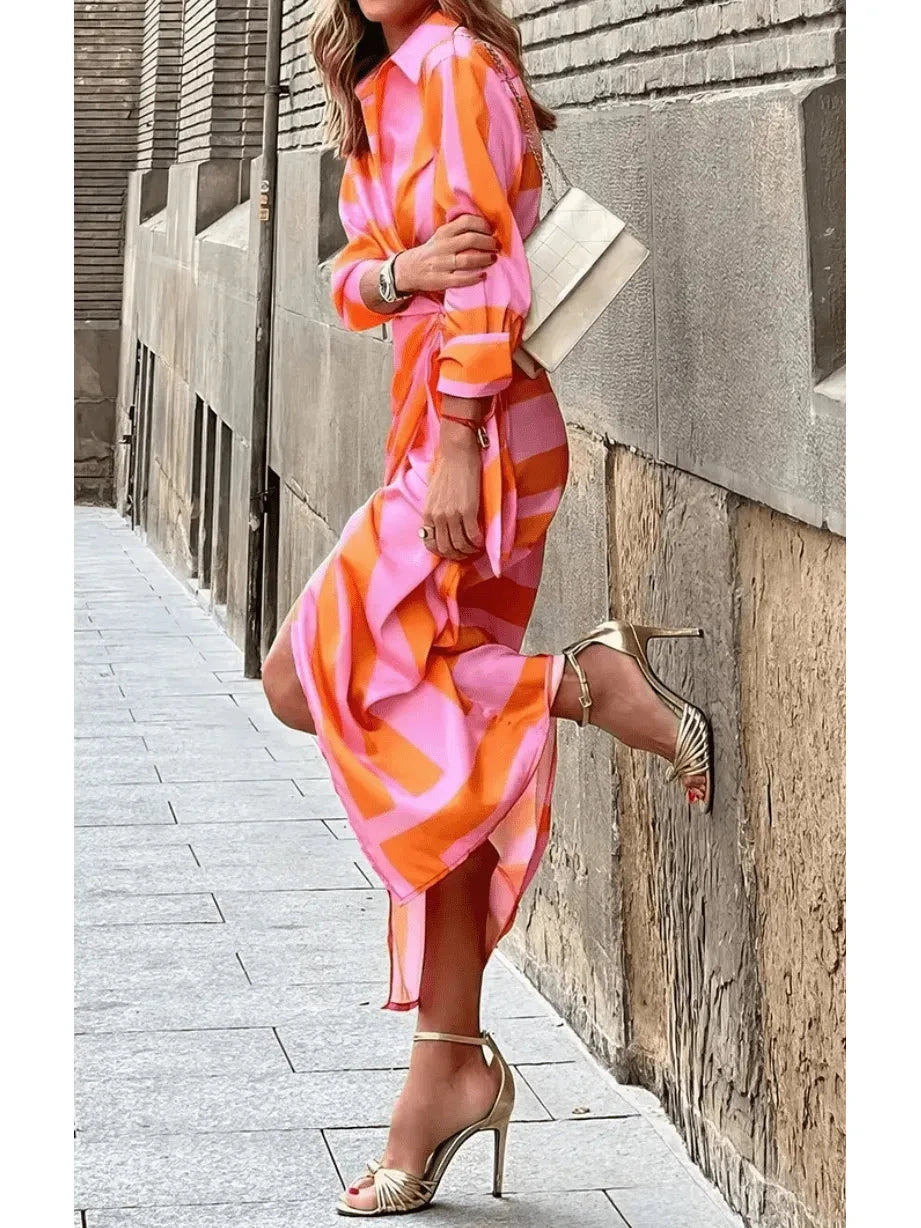 Lumina Vancouver Solana™ printed wrap dress in orange and pink, lightweight fabric, stylish design, perfect for summer wear.