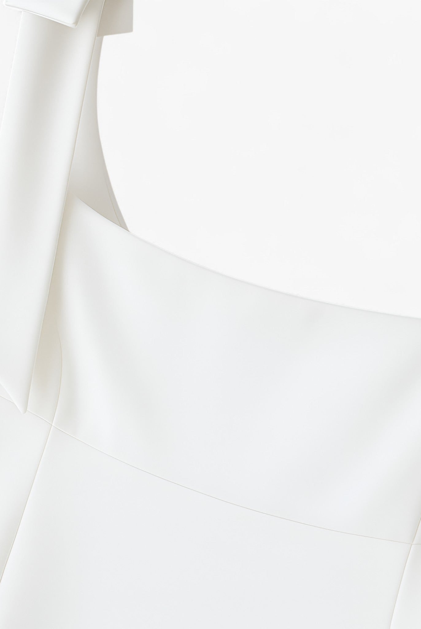 White Sophia bow-detail cami top with zipper closure from Lumina Wear, designed for women, showing front view with bow accents.