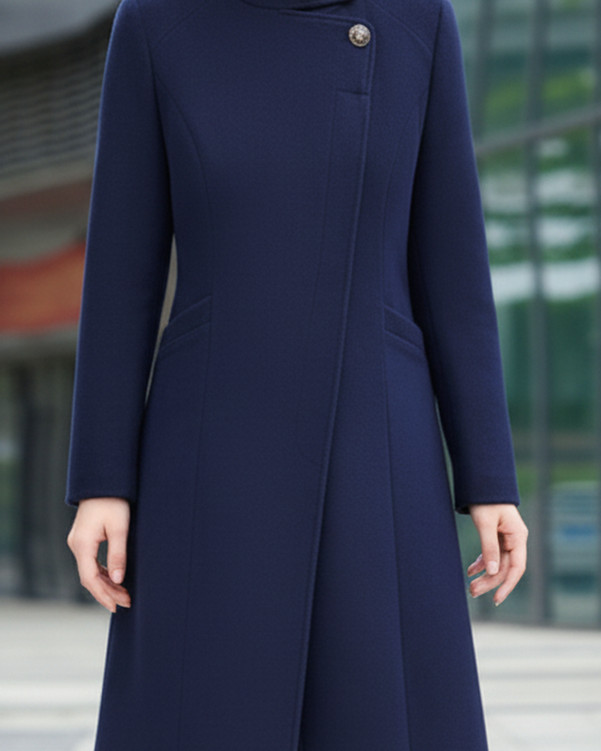 Navy blue Sophia Button Maxi Coat by Lumina Wear, showing front view with large buttons and tailored fit.