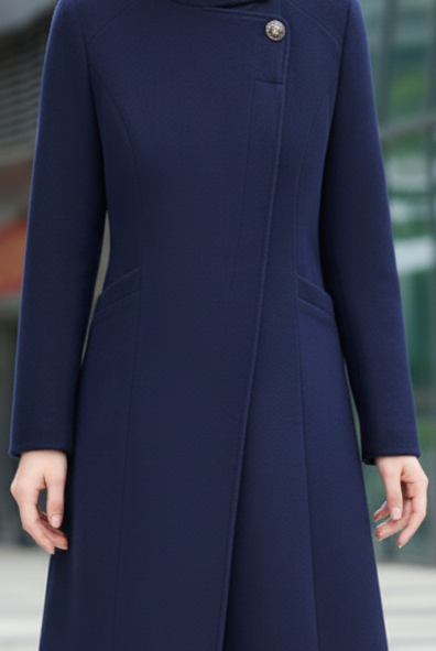 Navy blue Sophia Button Maxi Coat by Lumina Vancouver styled on a model, showing long coat with button details and wide collar.