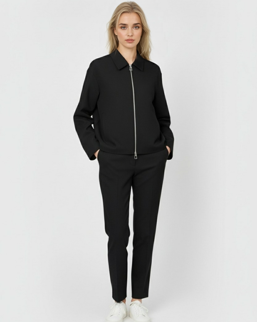 Sophia black casual bomber jacket by Lumina Wear with zipper closure and light blue accents, styled on a model.