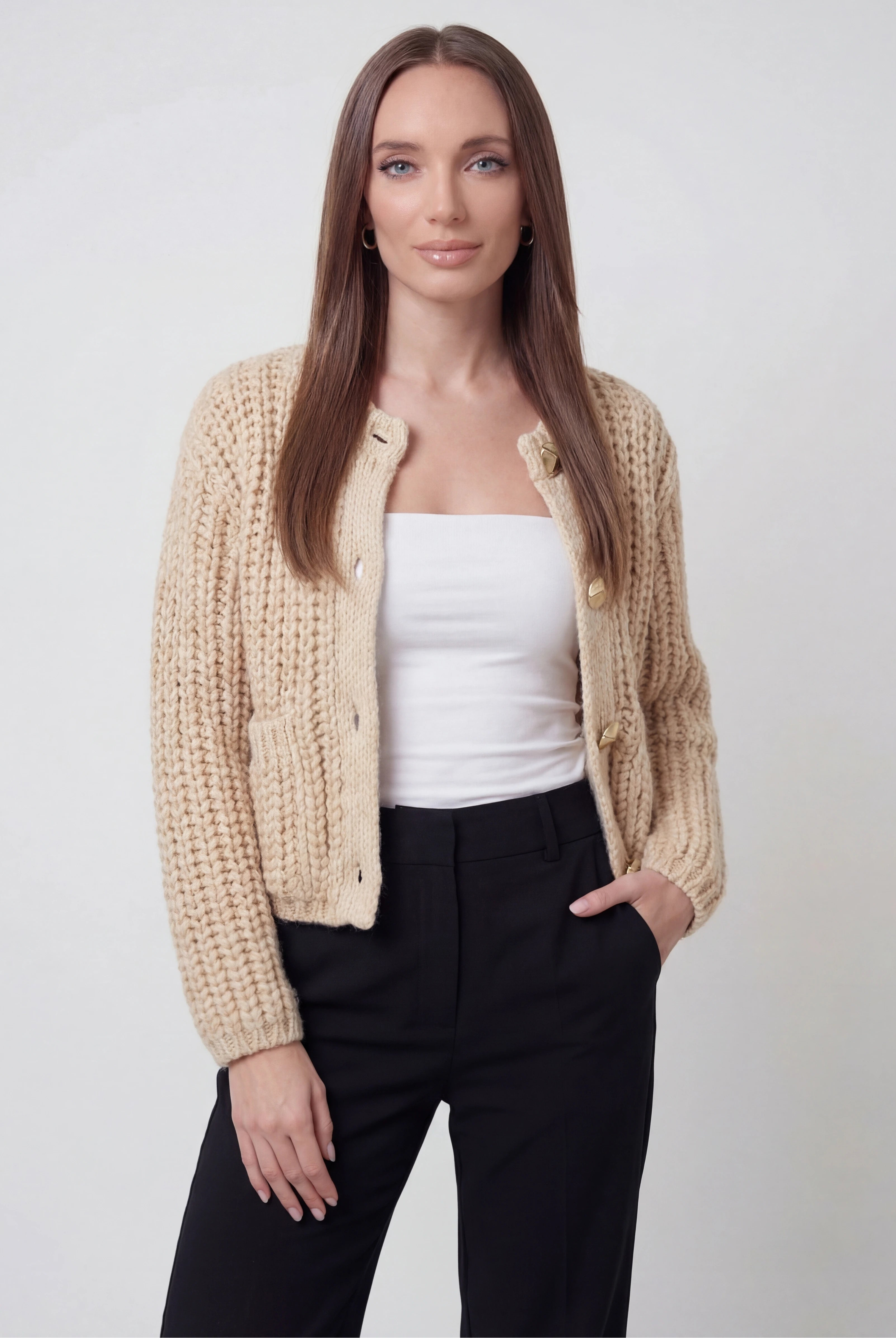 Sophia beige knit cardigan for women by Lumina Wear, featuring a cozy, relaxed fit and soft textured fabric.