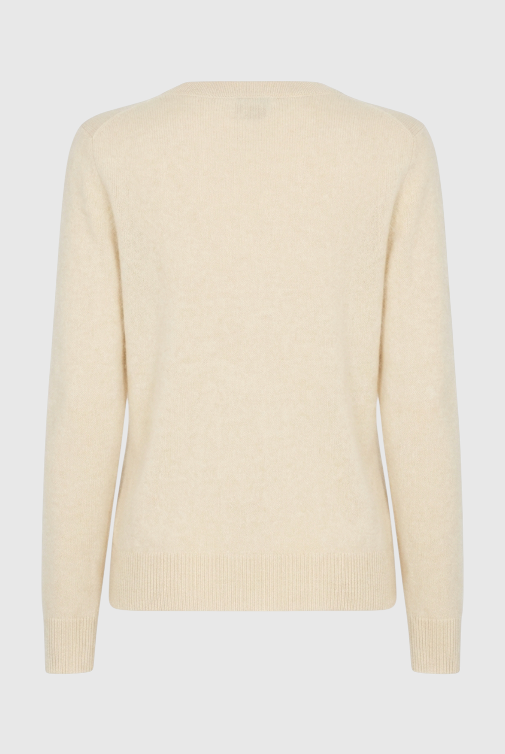 Beige V-neck women's sweater from Lumina Wear, featuring a cozy fit and flattering silhouette.