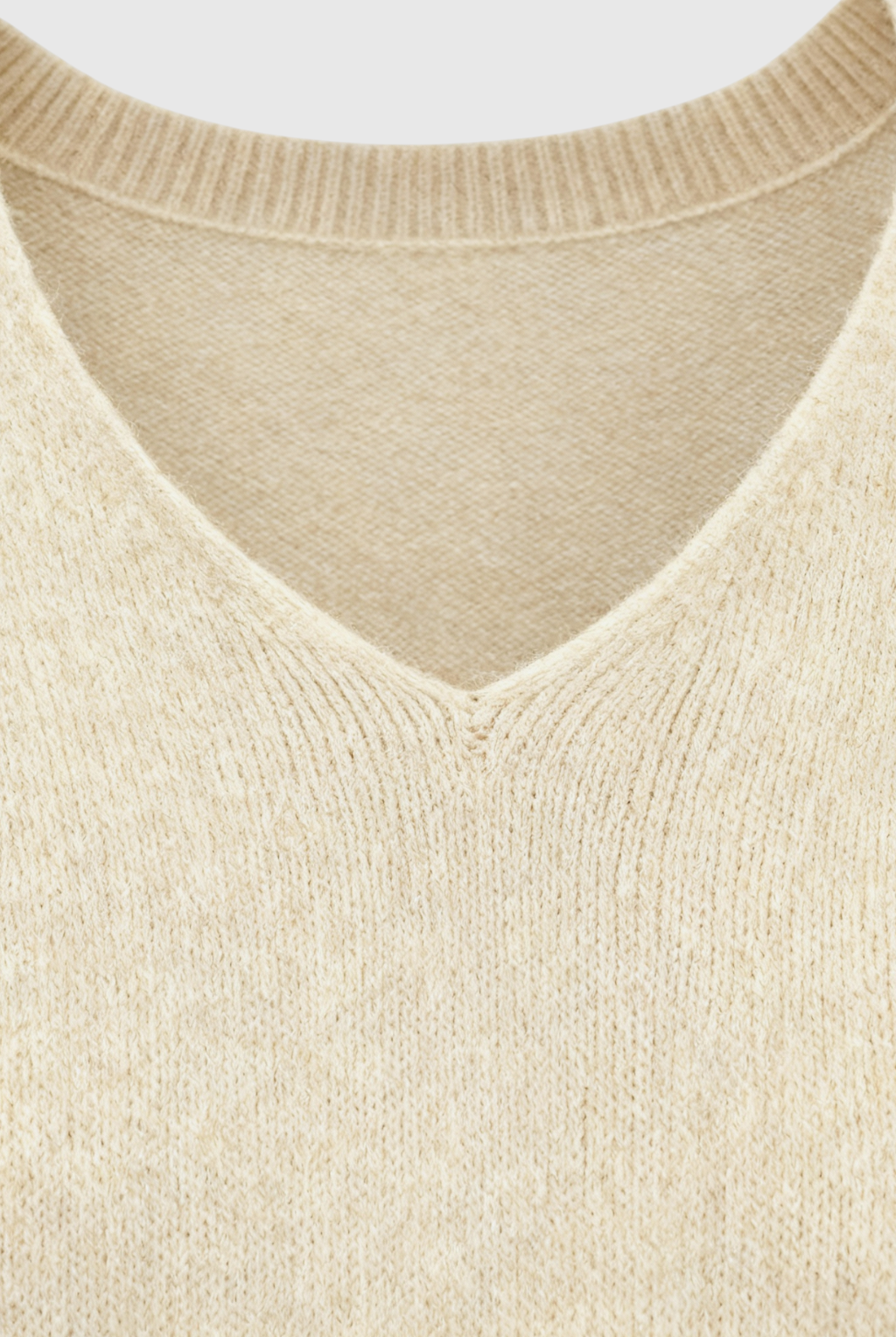 Cozy beige Lumina Wear Sophia V-neck women's sweater with a flattering fit, displayed on a plain background.