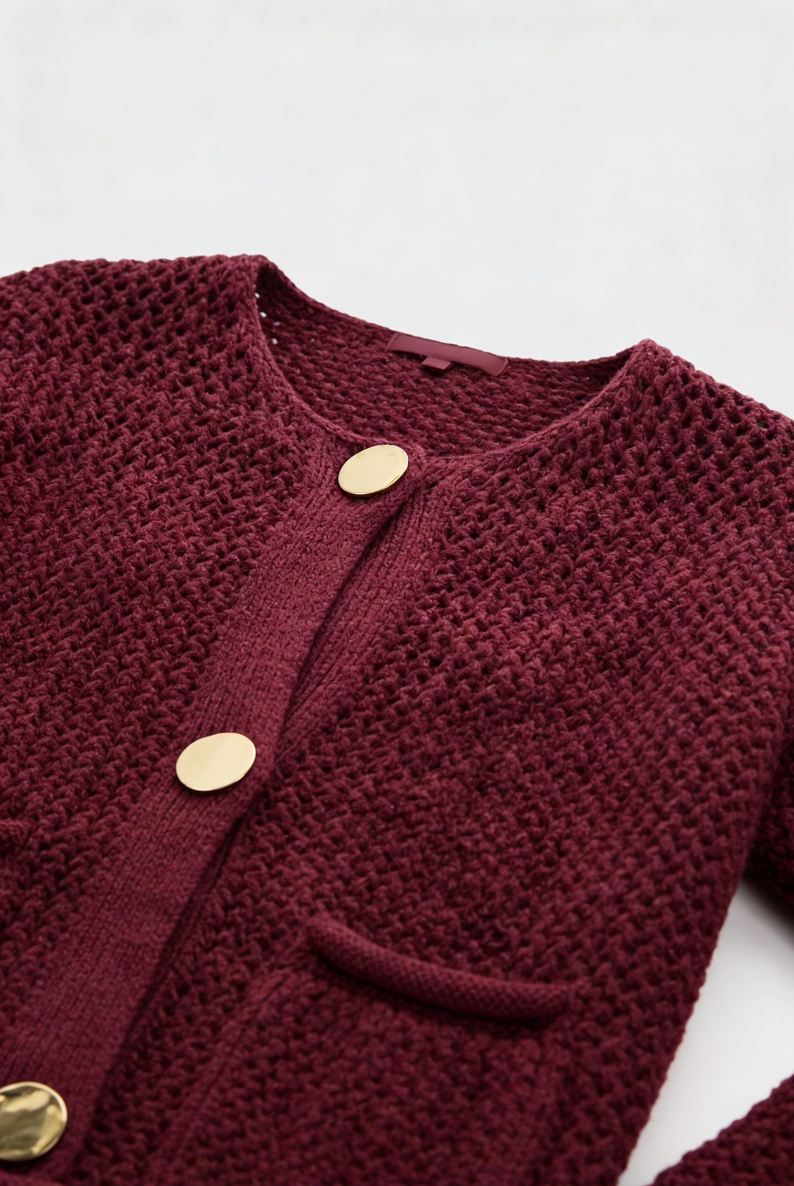 Sophia Lumina women's burgundy knit cardigan sweater with ribbed details, cozy and stylish for fall and winter wear.