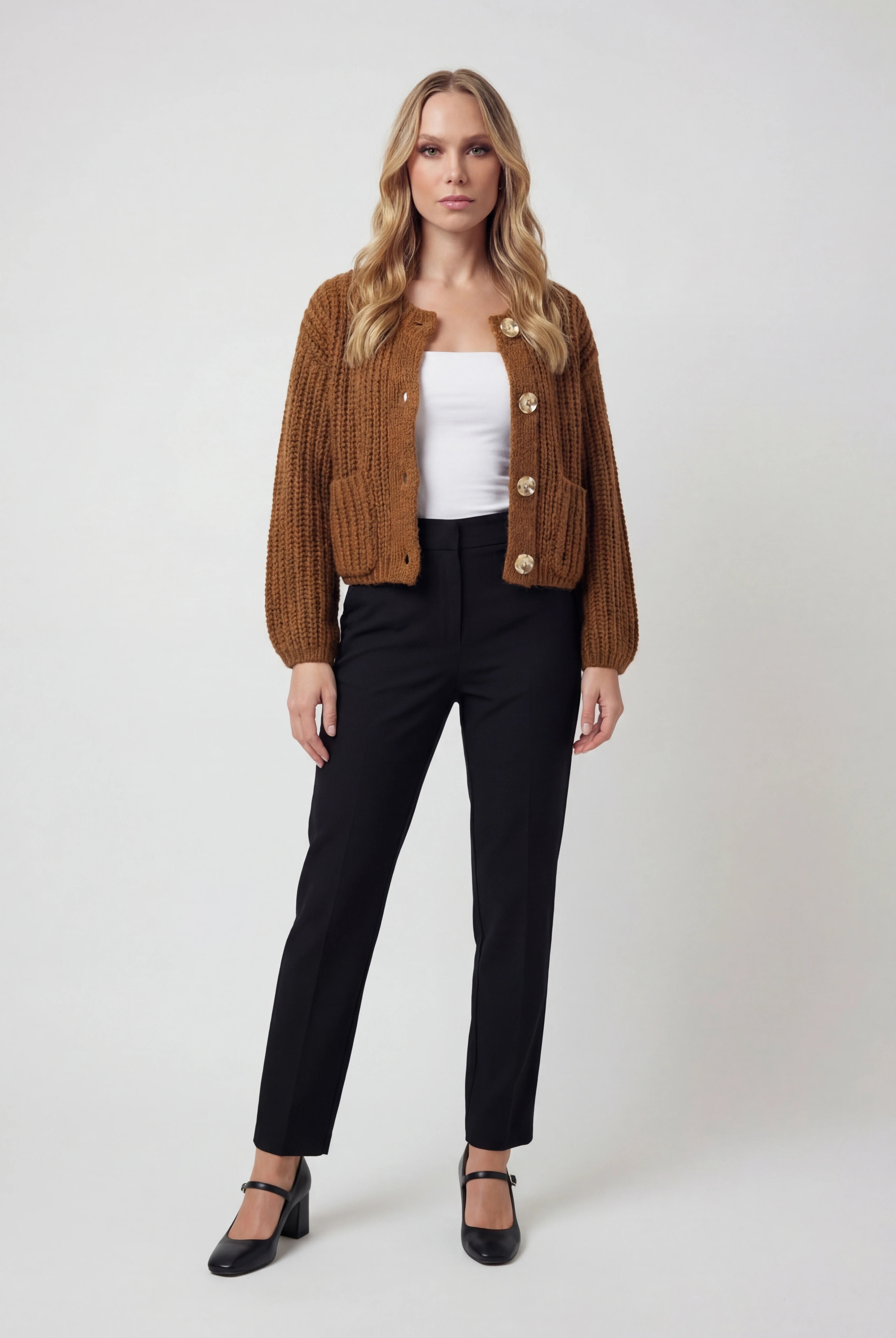 Sophia Lumina cozy long brown cardigan sweater with relaxed fit, displayed on a hanger showcasing its soft fabric and casual style.