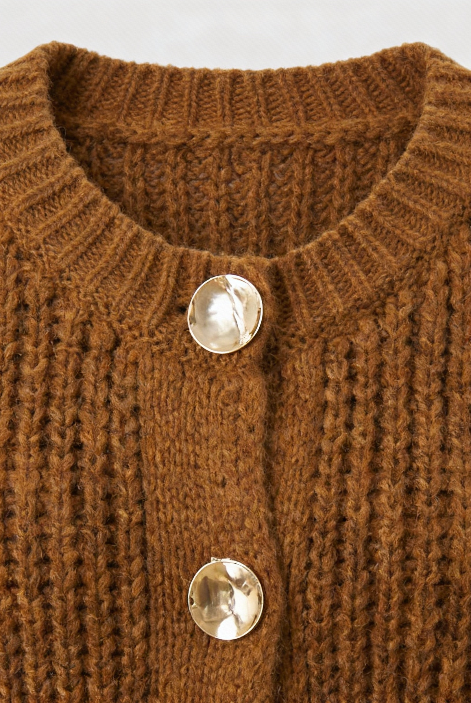 Sophia Lumina cozy long brown cardigan sweater with relaxed fit, displayed hanging with open front and ribbed cuffs.
