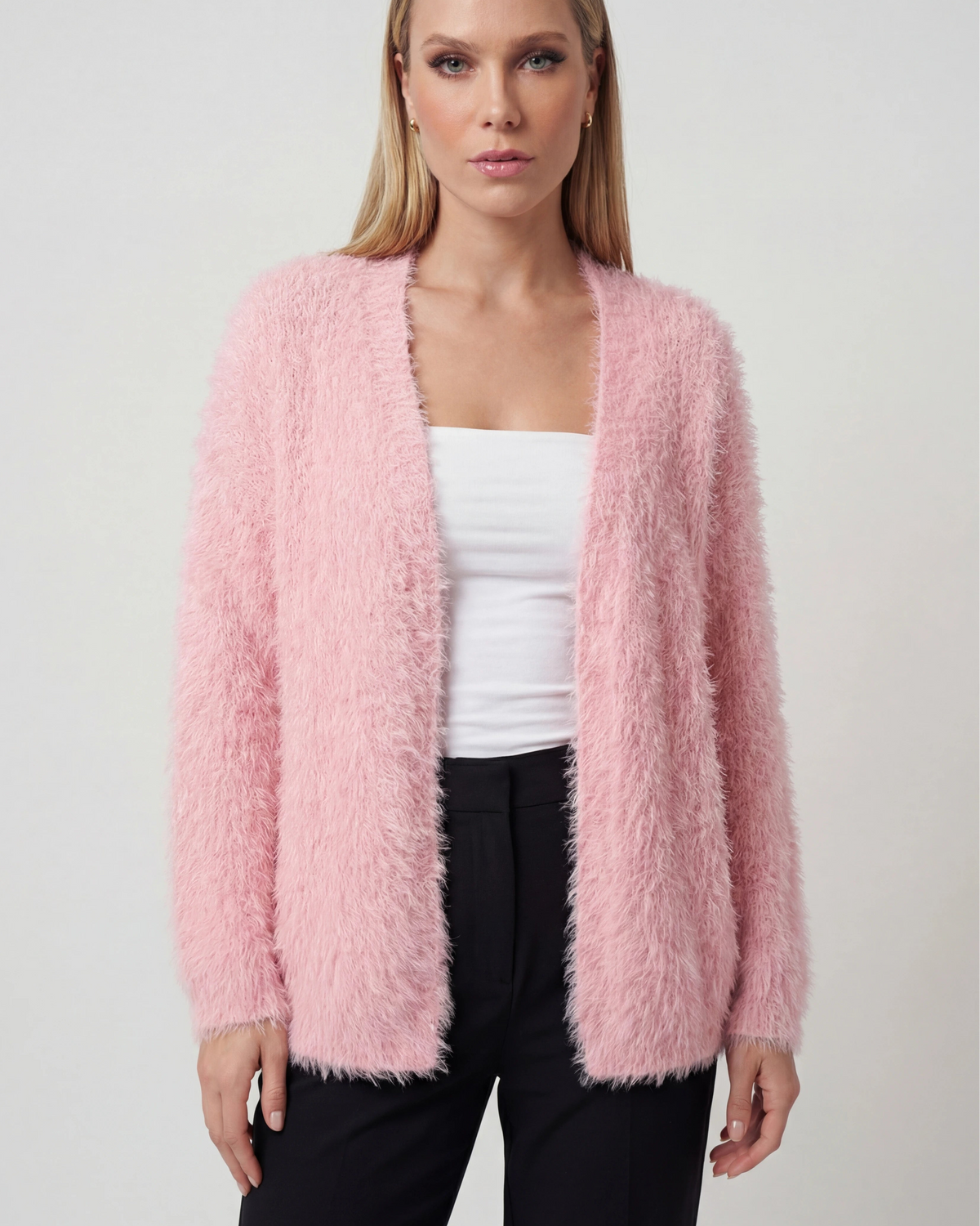 Lumina Wear Sophia pink knit cardigan with versatile styling, featuring cozy fabric and classic button closure.