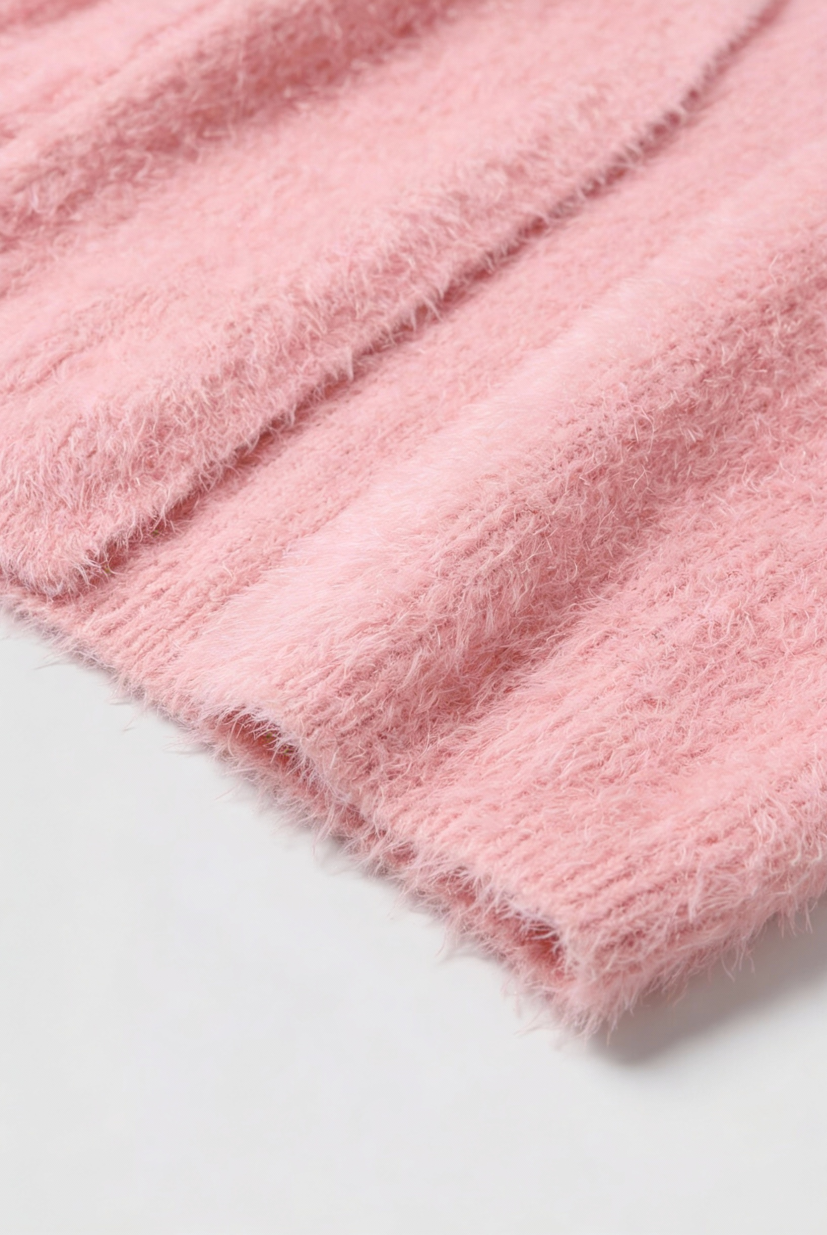 Lumina Wear Sophia pink knit cardigan with a cozy fit, perfect for versatile styling and casual wear.