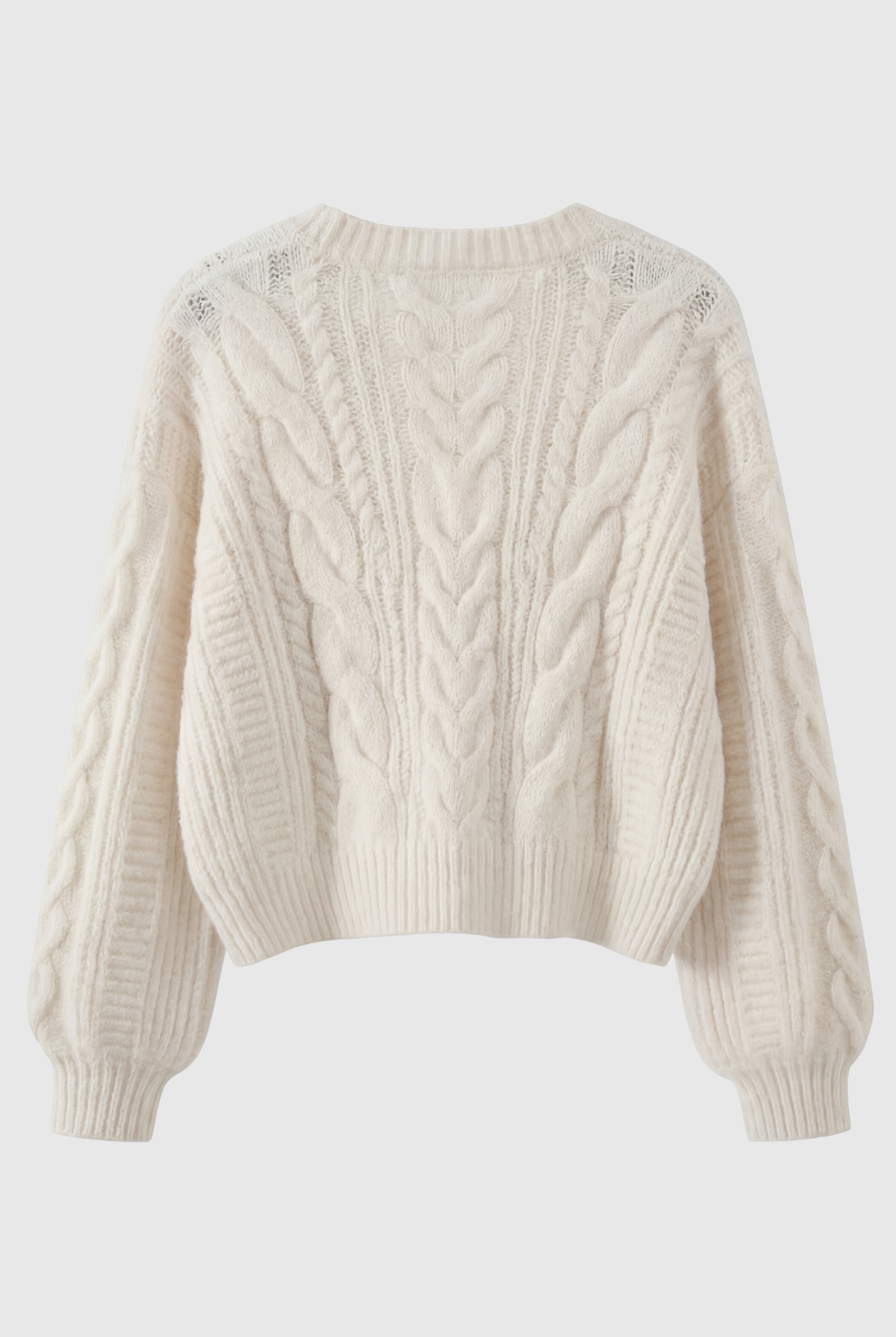 Lumina Wear Sophia white cardigan sweater with relaxed fit and ribbed hem, styled for cozy, casual wear.