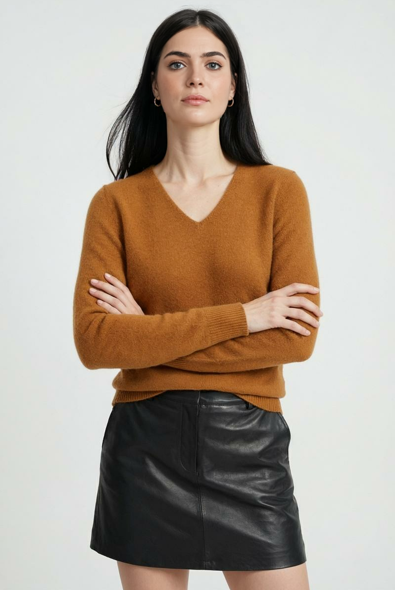 Lumina Wear Sophia cozy orange V-neck sweater with a flattering fit, featuring soft knit fabric and stylish design.