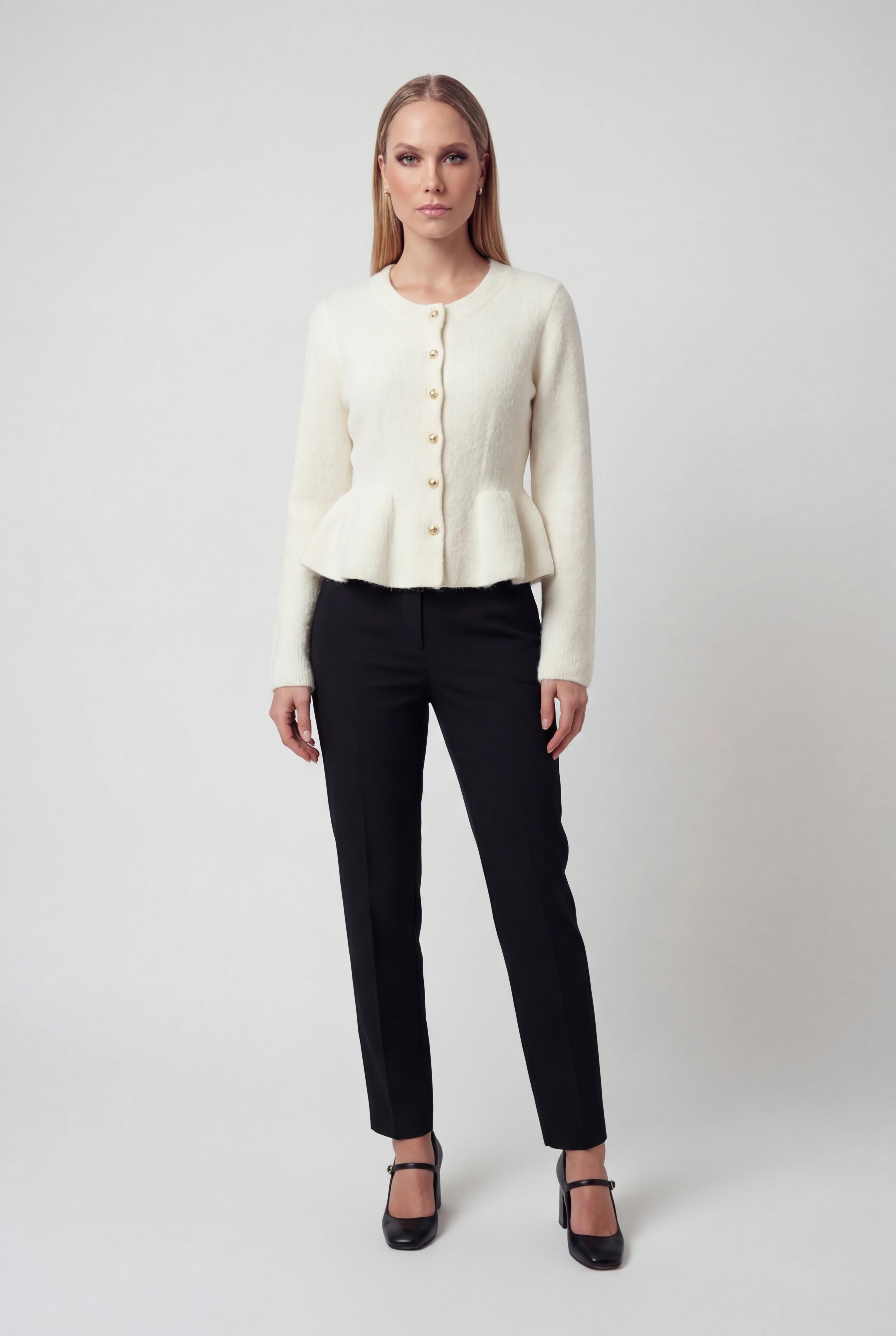 Sophia white cardigan sweater with ruffle details by Lumina Wear, featuring cozy knit fabric and stylish ruffle accents.