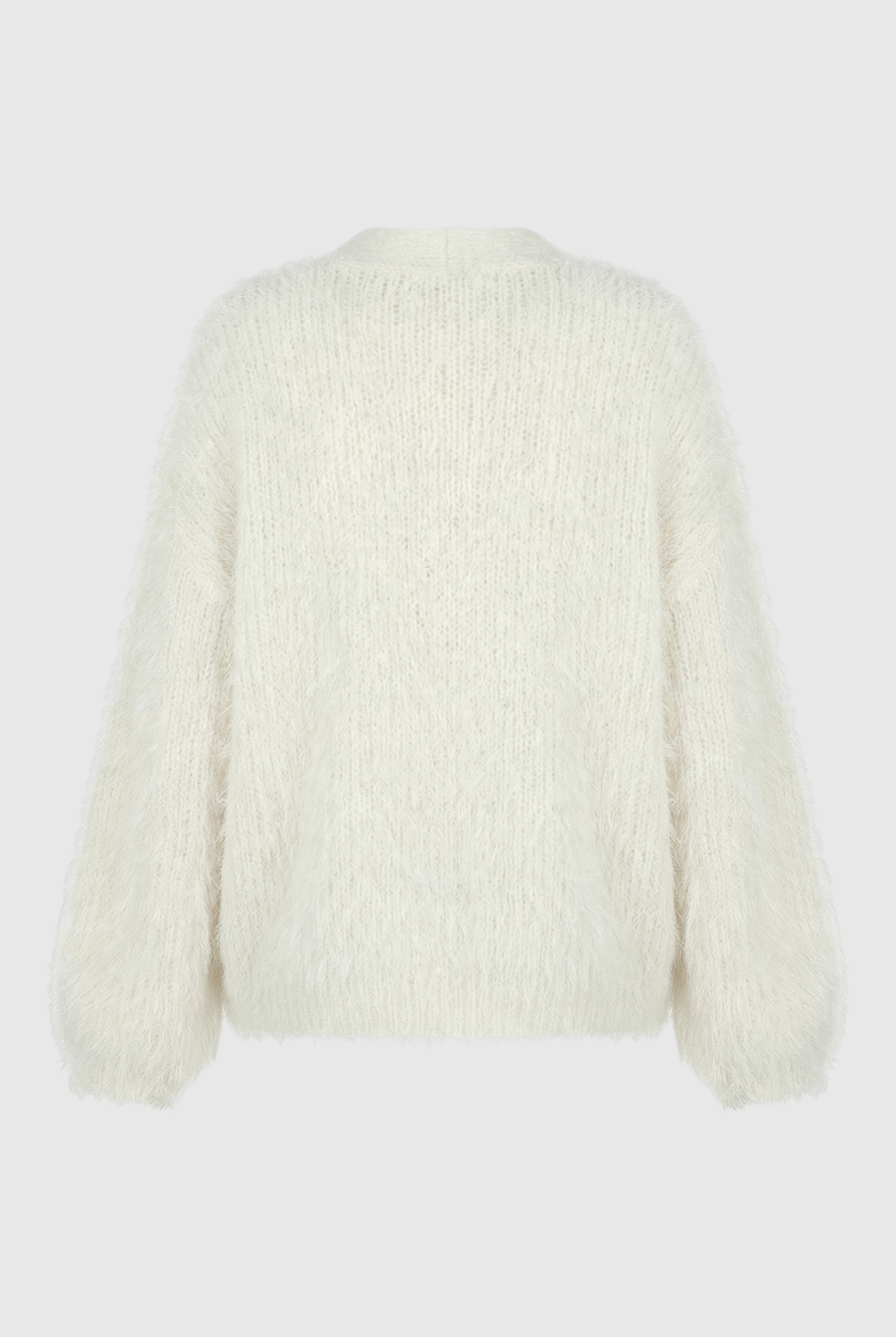 Lumina Wear Sophia cozy white knit cardigan with ribbed hem, featuring a soft, warm sweater with long sleeves and open front design.