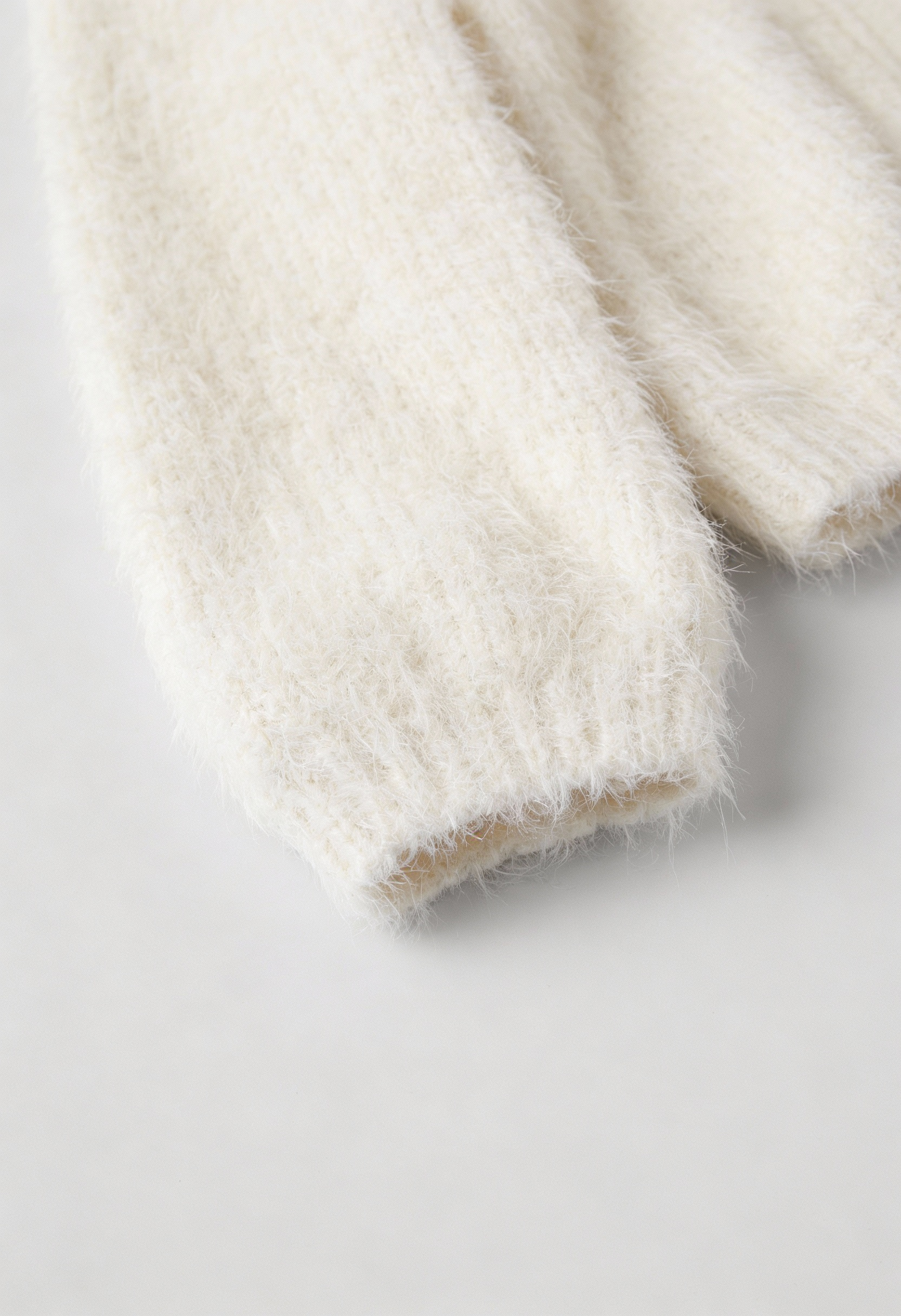 Sophia white knit cardigan by Lumina Wear with ribbed hem, cozy long-sleeve sweater for women, casual and stylish.