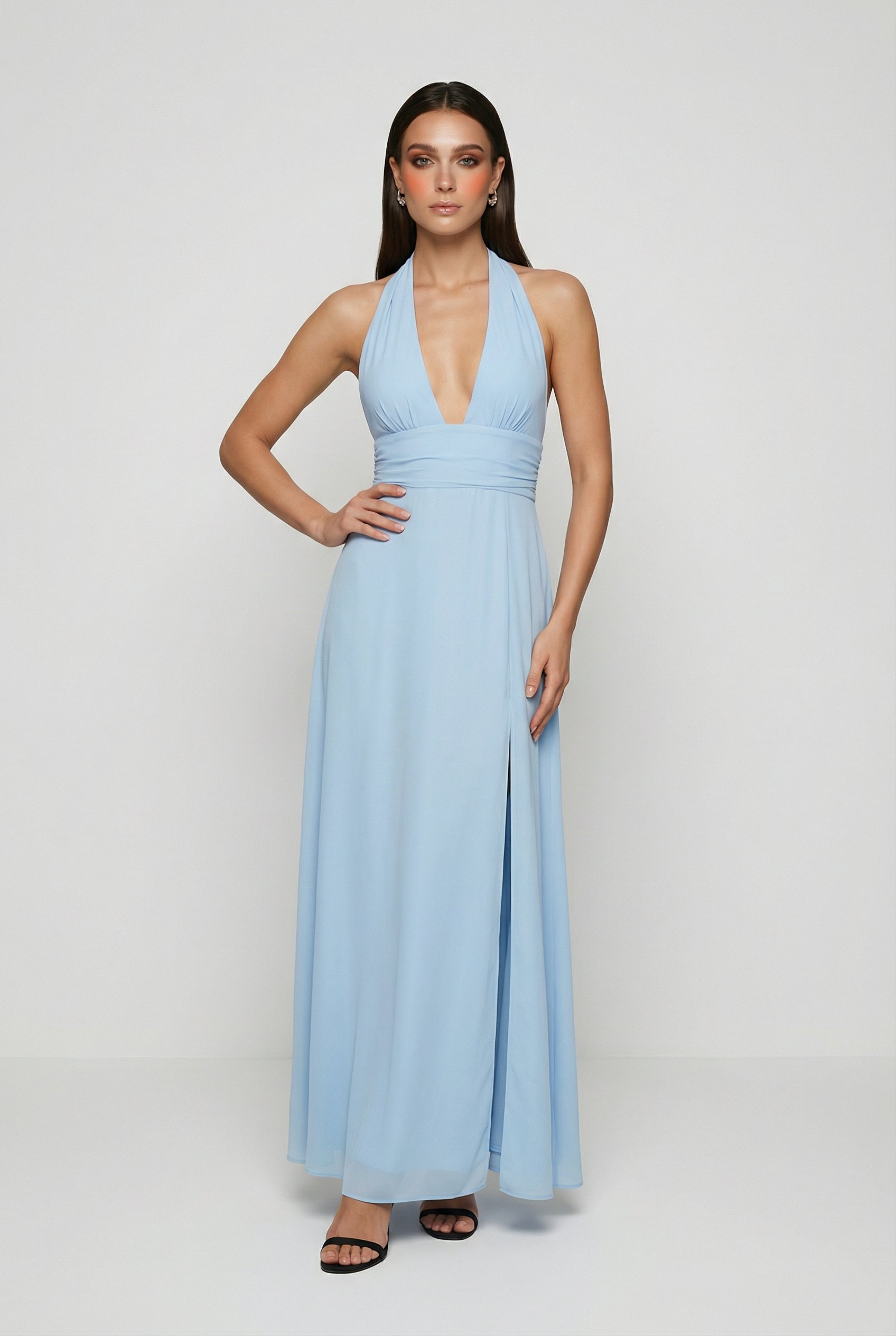 Elegant blue Maxi Dress by Lumina Wear featuring a backless design, flowing fabric, and sophisticated style.