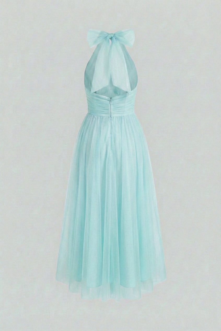 Elegant blue midi dress by Lumina Wear featuring a flattering silhouette and sophisticated design.