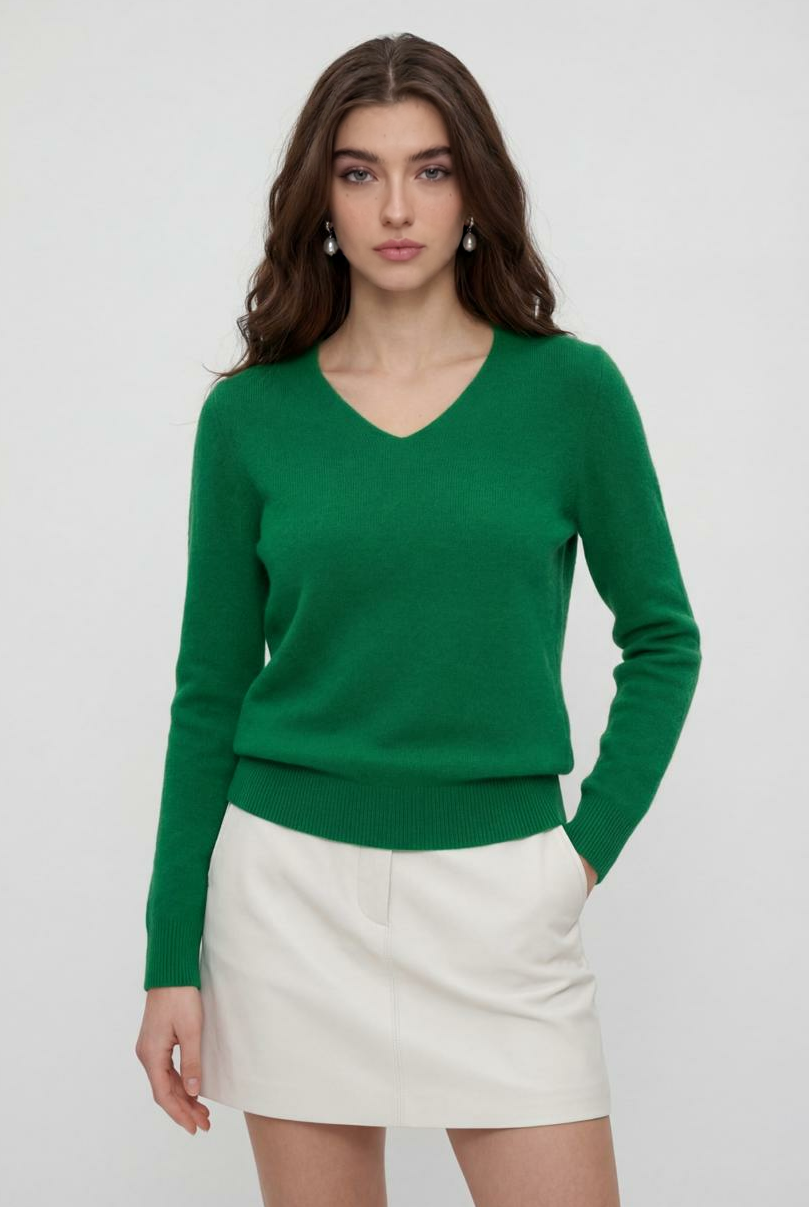 Lumina Wear Sophia green V-neck sweater with fitted silhouette, showcasing a stylish and elegant sweater on a model.