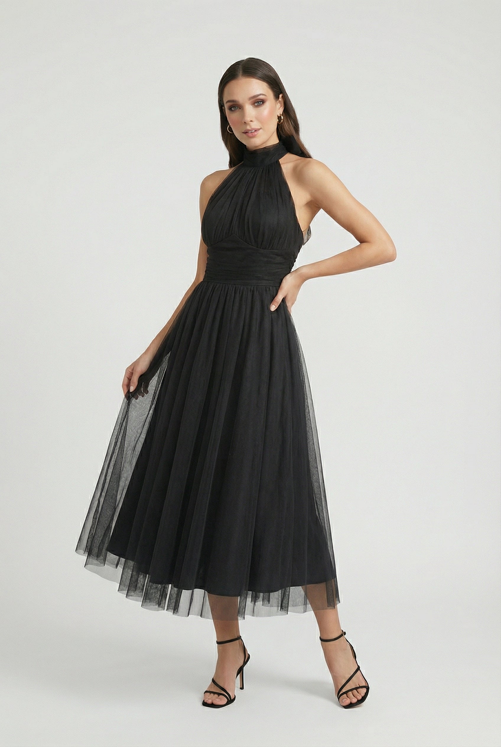 Sophia Lumina Wear women's black long sleeve midi dress with a flattering silhouette, elegant design, perfect for formal occasions.