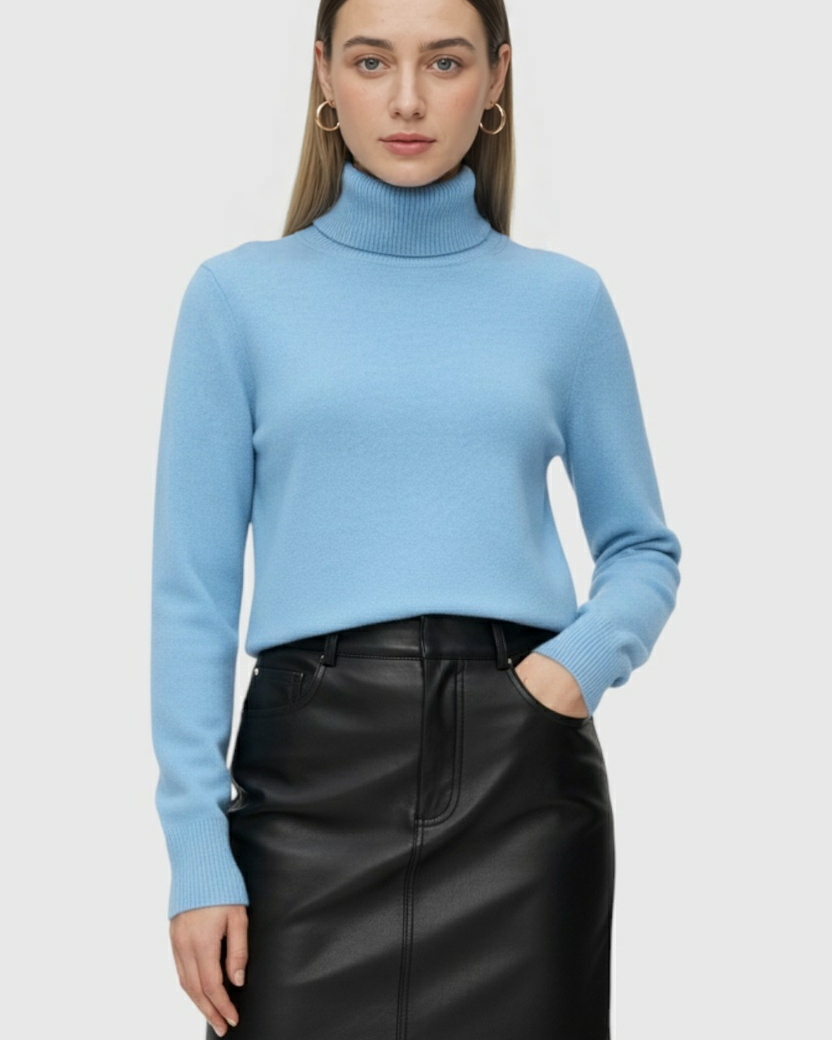 Blue Lumina Wear Sophia slim fit turtleneck sweater, showcasing a close-up of the elegant sweater's fabric and fitted design.