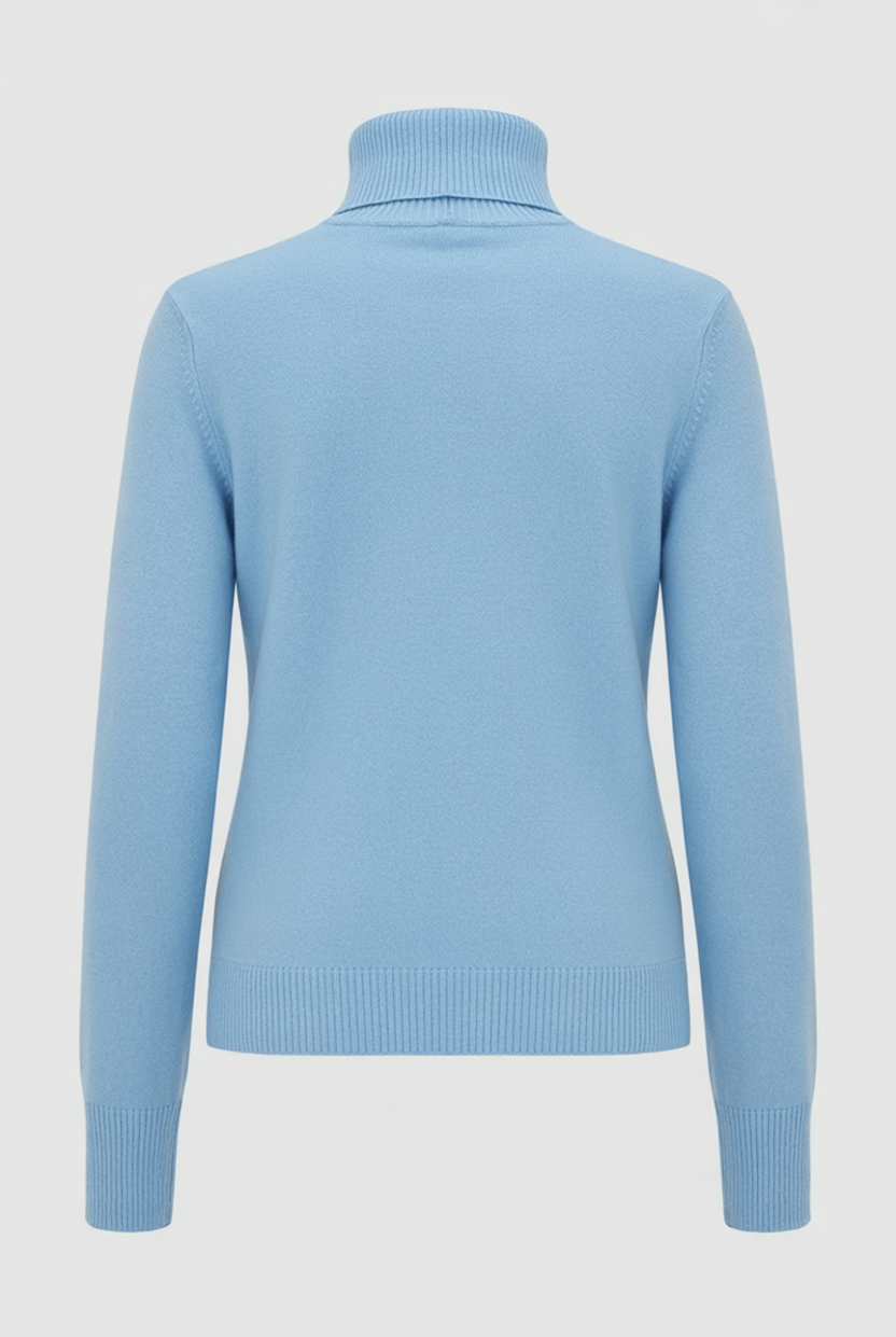 Blue Sophia Lumina Wear slim fit turtleneck sweater, showing its cozy knit and fitted design in a close-up shot.