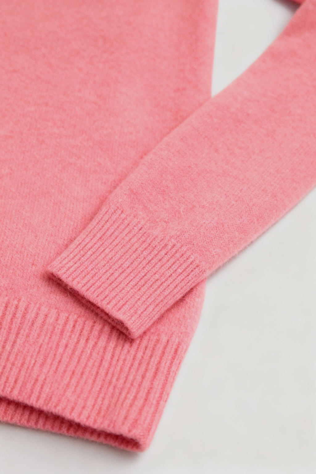 Pink Lumina Wear Sophia V-Neck Knit Sweater with long sleeves, flattering design and cozy knit texture.