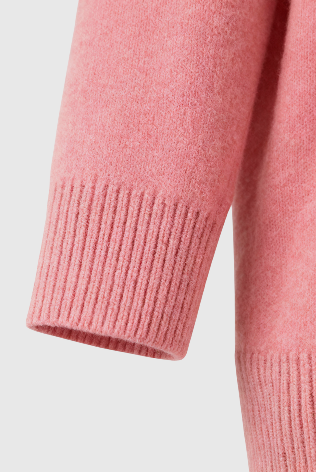 Pink Lumina Wear Sophia sweater with a flattering V-neck, knit design, and long sleeves, perfect for cozy stylish looks.