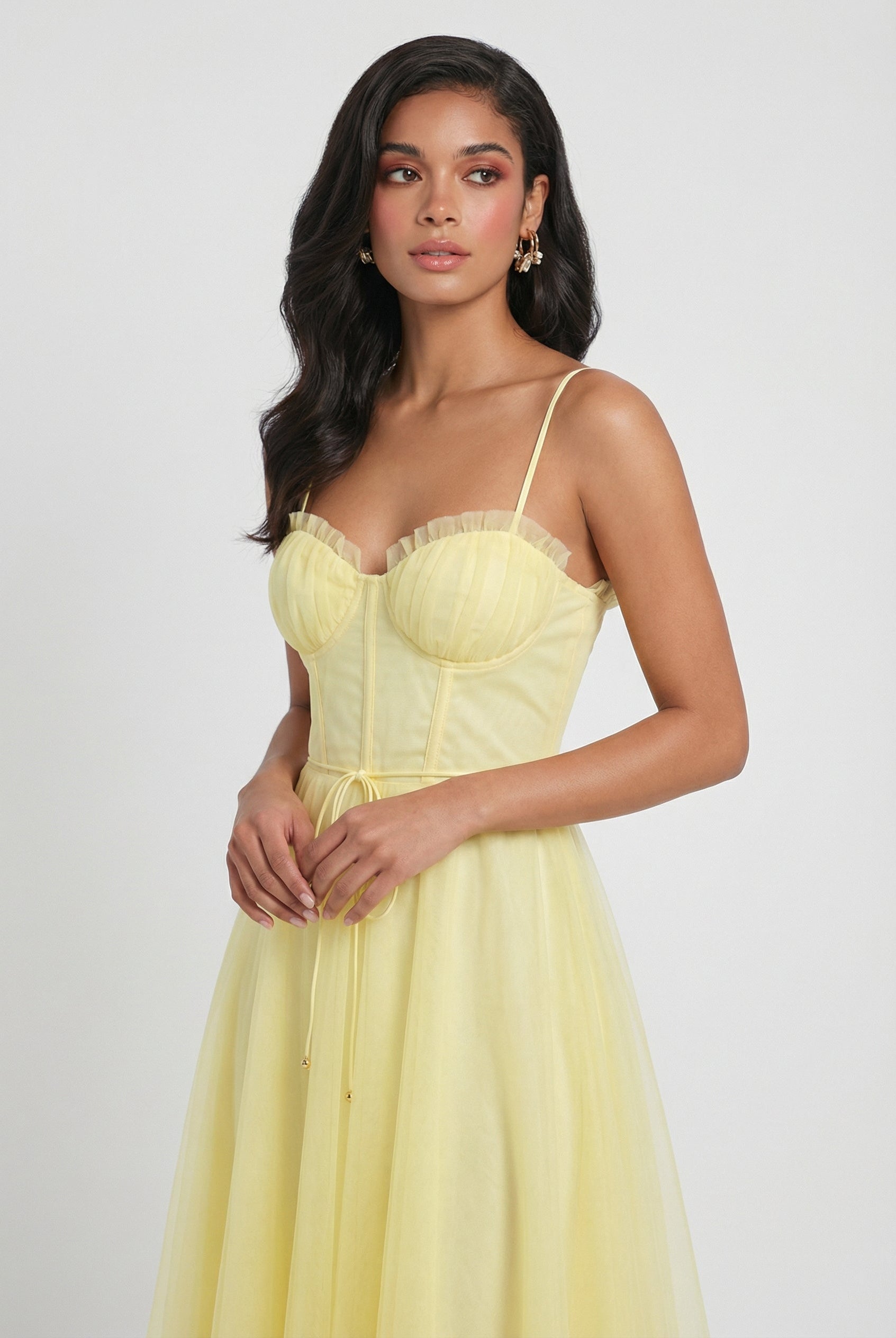 Flowy yellow midi dress by Lumina Wear featuring an elegant, lightweight design perfect for summer or special occasions.