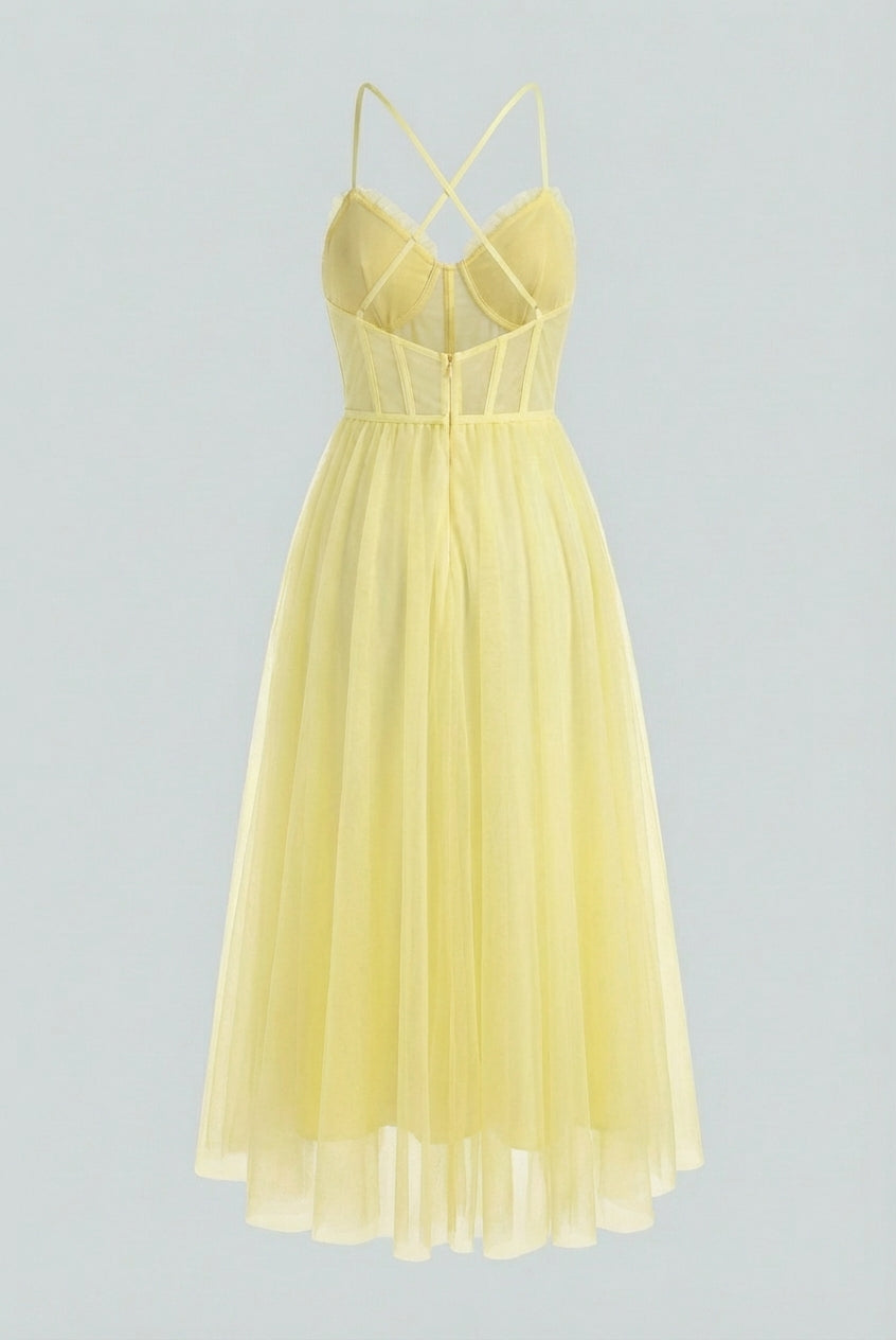 Flowy yellow midi dress from Lumina Wear featuring an elegant design, perfect for stylish occasions.