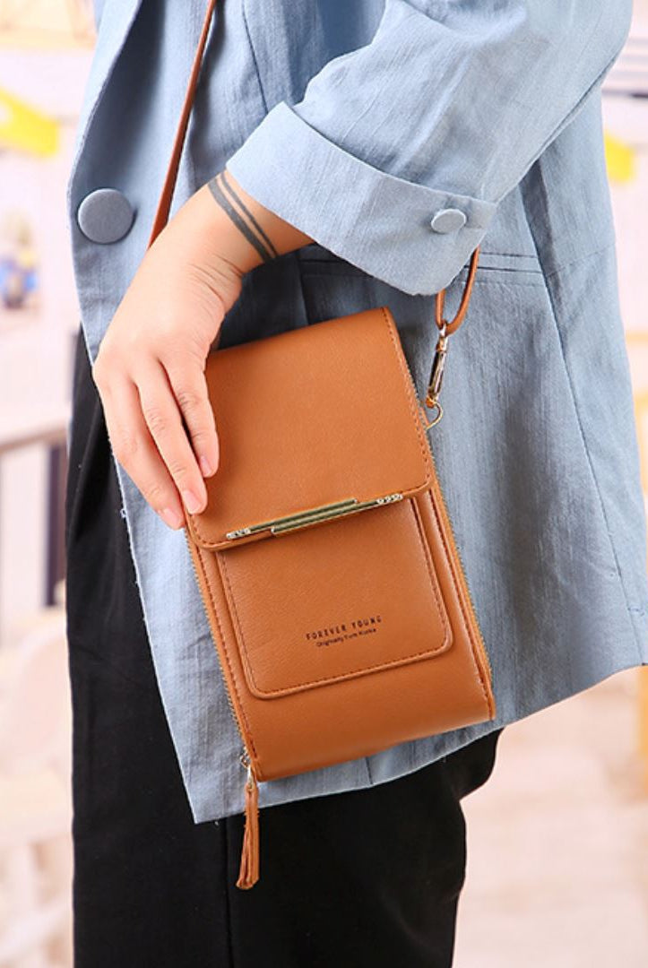 Sophia modern vegan leather shoulder bag with touch features by Lumina Wear, in mocha color, stylish handbag image.